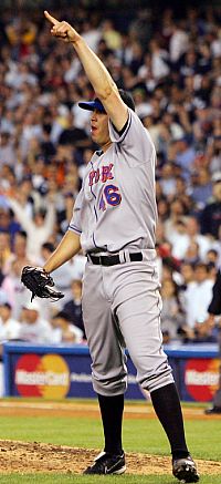 New York Mets pitcher Oliver Perez approves of a fourth-inning double play against the Yankees