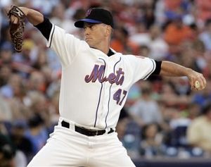 New York Mets pitcher Tom Glavine pitches to his 296th career victory against the Oakland Athletics New York Mets pitcher Tom Glavine pitches to his 296th career victory against the Oakland Athletics
