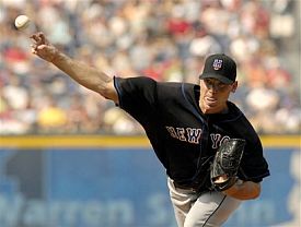 The Mets Mike Pelfrey delivers a pitch against the Braves in Atlanta The Mets Mike Pelfrey delivers a pitch against the Braves in Atlanta