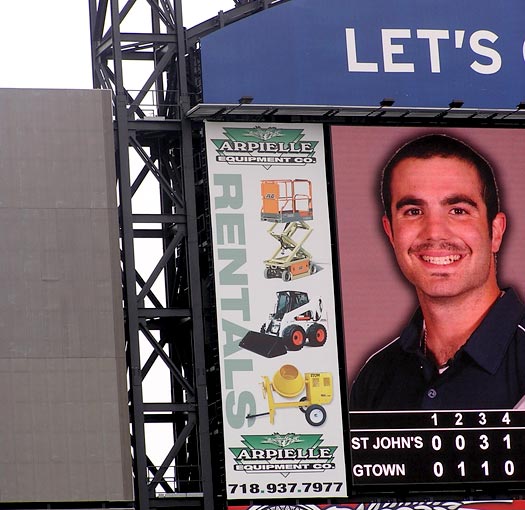 Arpielle construction ad on Citi Field scoreboard