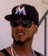 Jordany Valdespin wearing Miami Marlins baseball cap